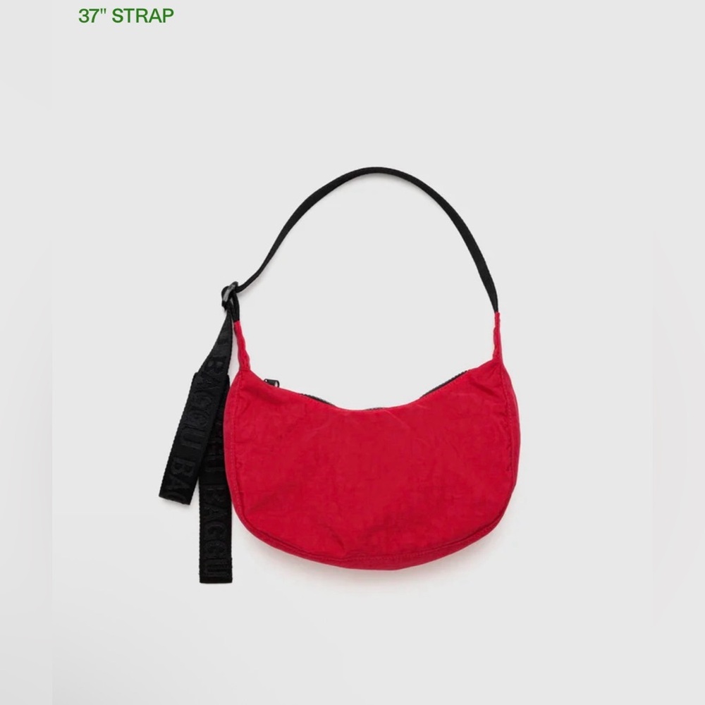 BAGGU Small Nylon Crescent Bag
COLOR: Candy Apple 37"like new - Picture 4 of 7